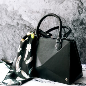 a black bag with scarf